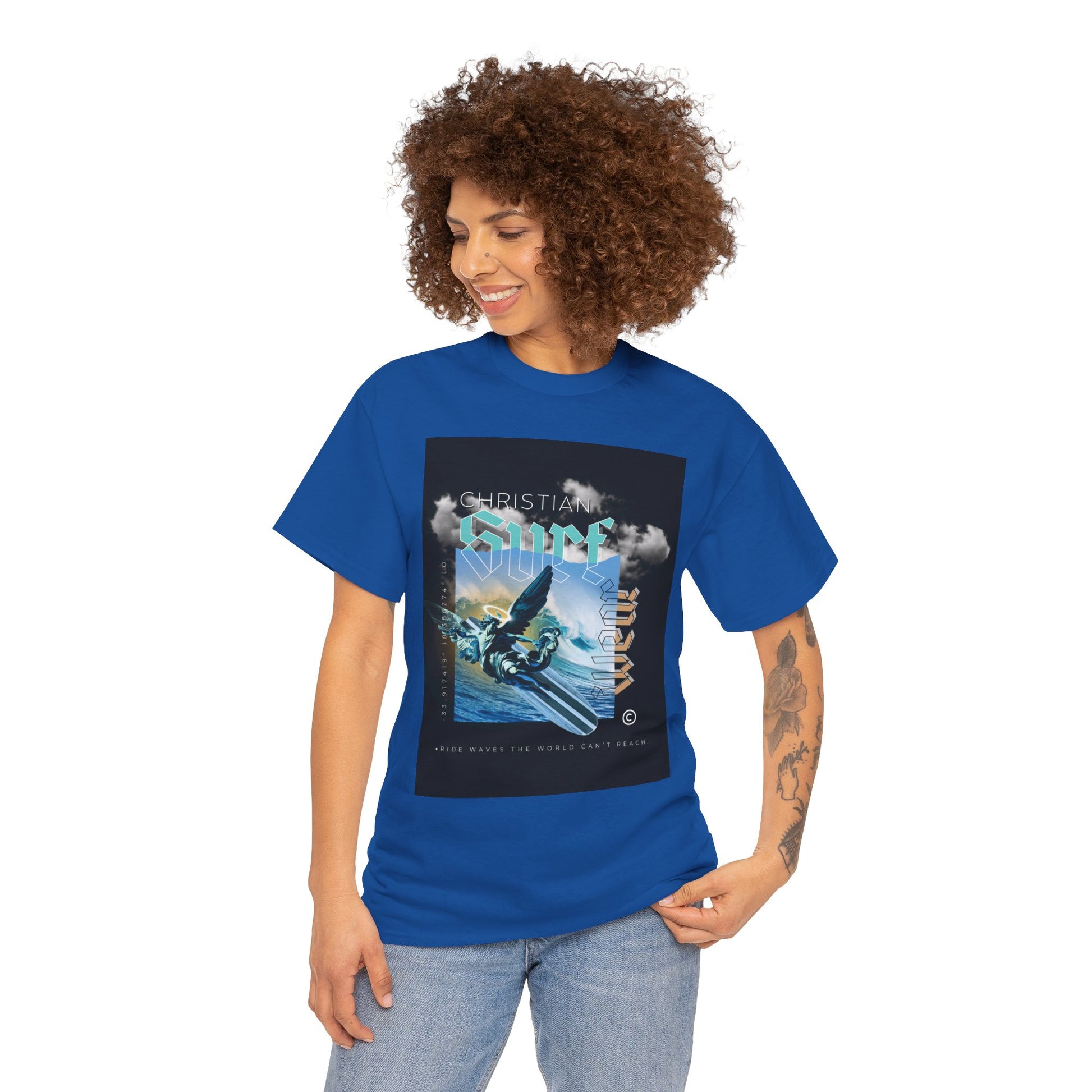 Surf Wear Angle Riding a Surfboard and a wave Graphic -Christian Surf Vibes Unisex Heavy Cotton Tee, Beachwear, Casual Shirt, Gift for Surfers, Summer Top, Spiritual Fashion